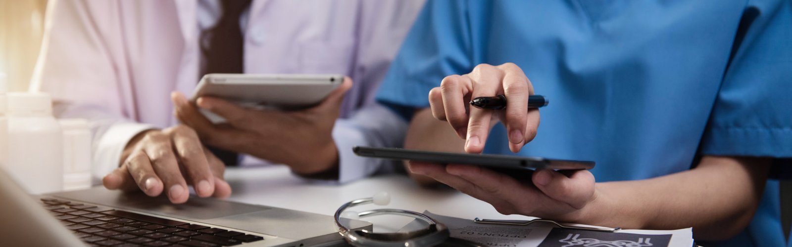 professionals holding tablet