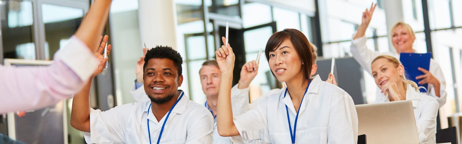 nurses raising there hands